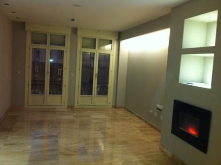 Acceso a terraza con puertas francesas